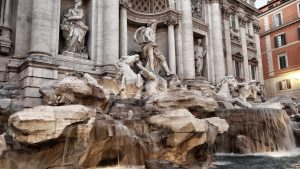 throw a coin in the Trevi Fountain