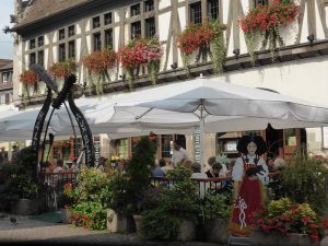 a restaurant scene in Town of Obernai in France